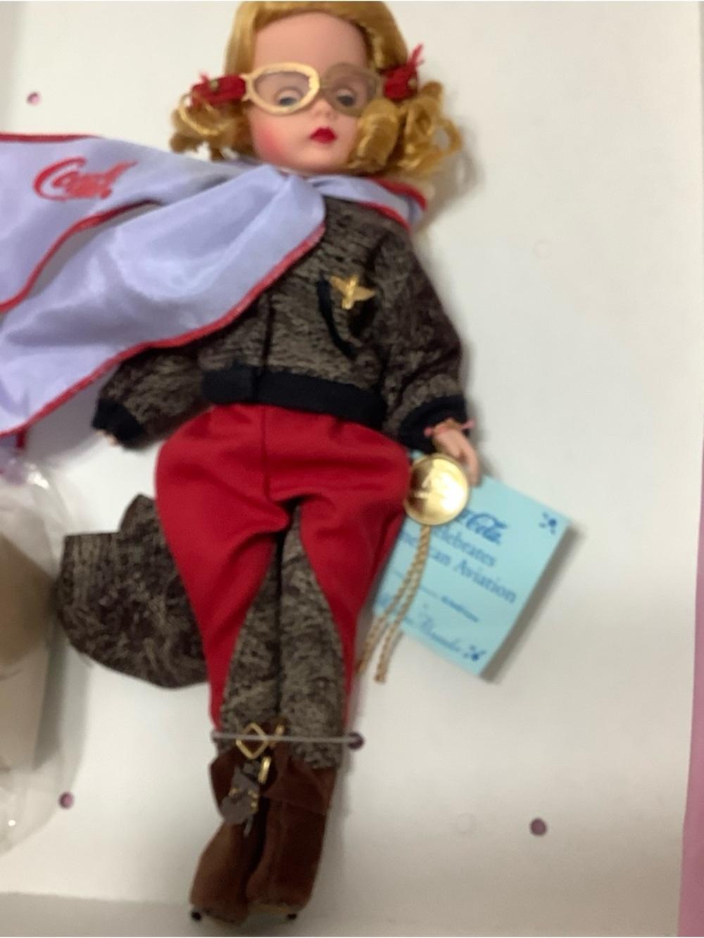Coca Cola Doll in Red Pants with Light Blue Scarf and Brown Boots